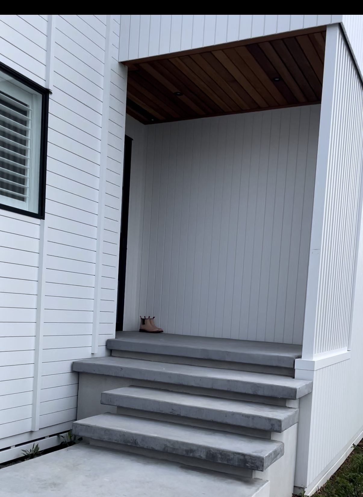Concrete entry steps on a residential build